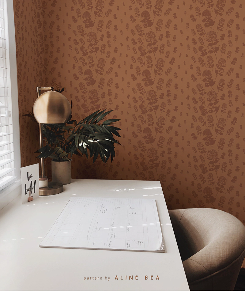 floral pattern by Aline Bea on wallpaper in a home office