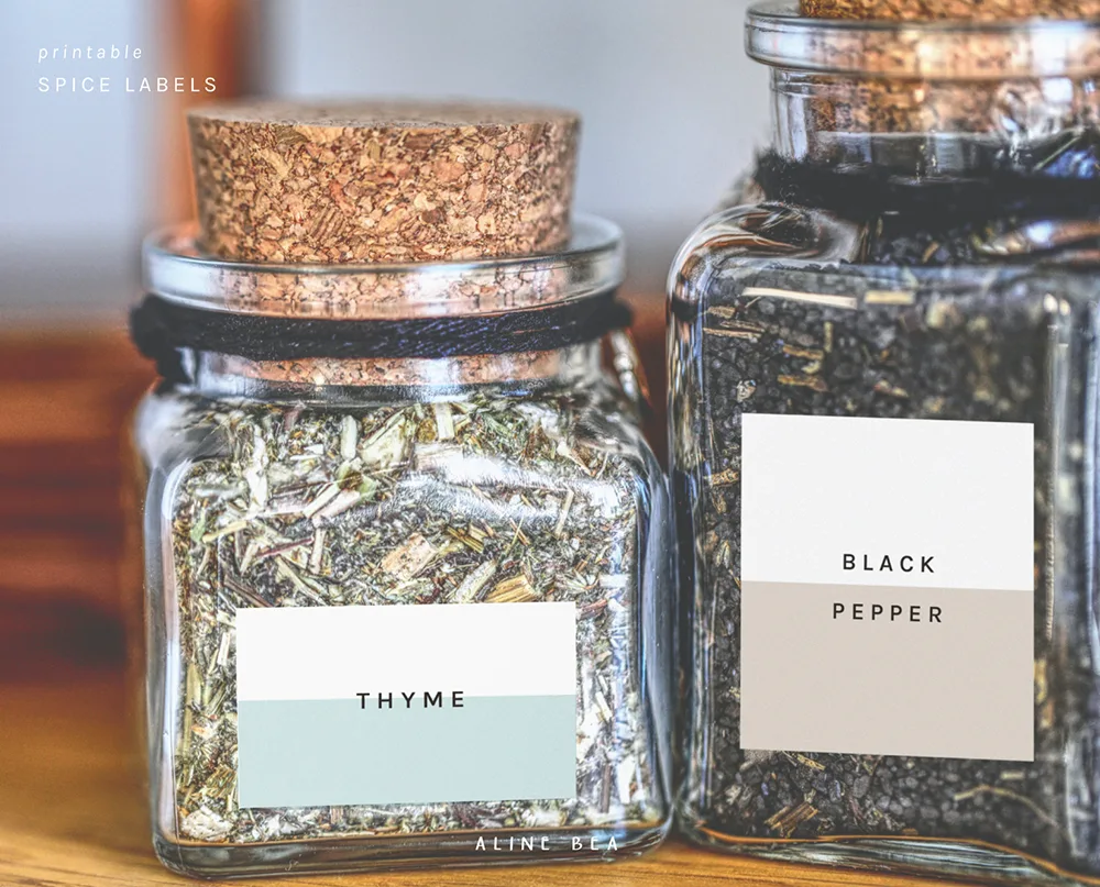 Spice jars with labels designed by Aline Bea