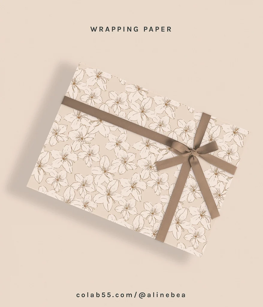 Gift box wrapped on a floral wrapping paper with a lace.
