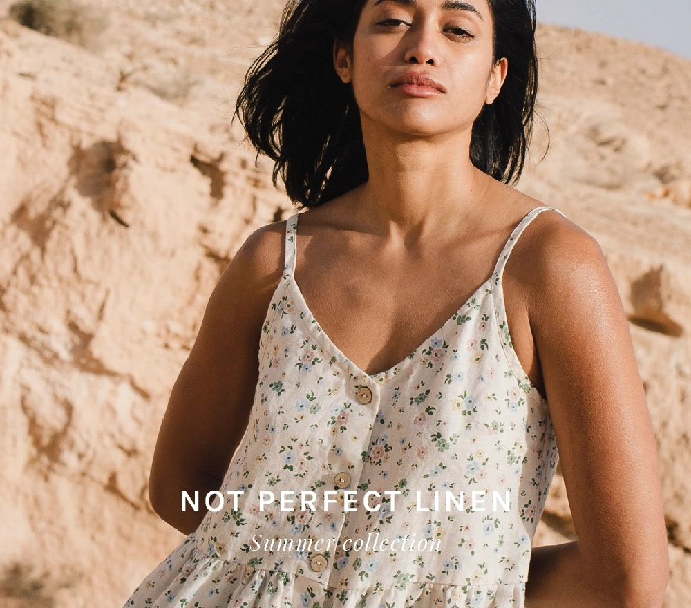 Woman-wearing-a-dress-from-Aline-Bea-X-Not-Perfect-Linen-summer-collection