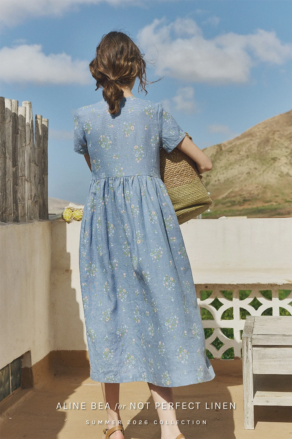 model-wearing-floral-pattern-design-by-AlineBea-on-Not_perfect_linen-dress
