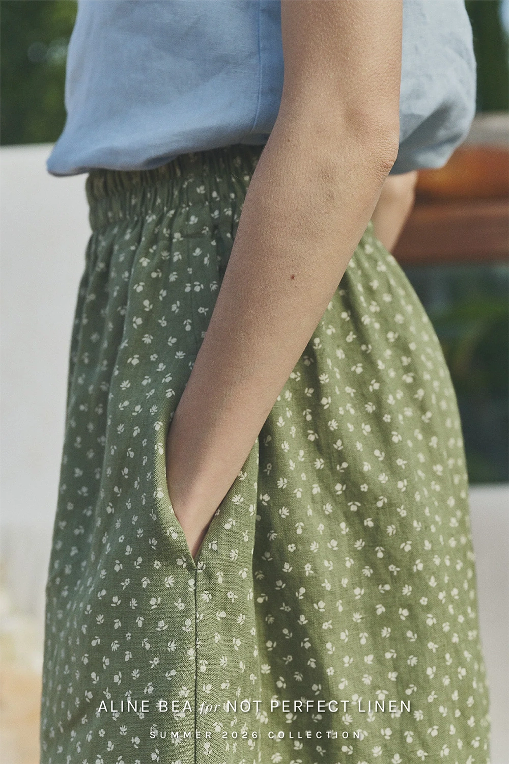 model-wearing-floral-pattern-design-by-AlineBea-on-Not_perfect_linen-skirt