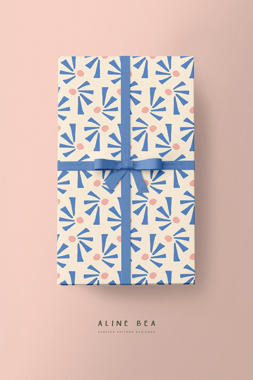 gift-wrapped-in-wrapping-paper-displaying-geometric-pattern-design-by-AlineBea