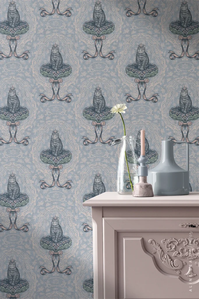 Blue damask wallpaper with illustrated crowned cats in an ornate cartouche
